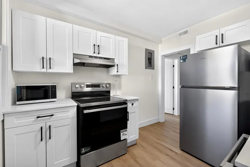 Furnished kitchen at McEwan Suites