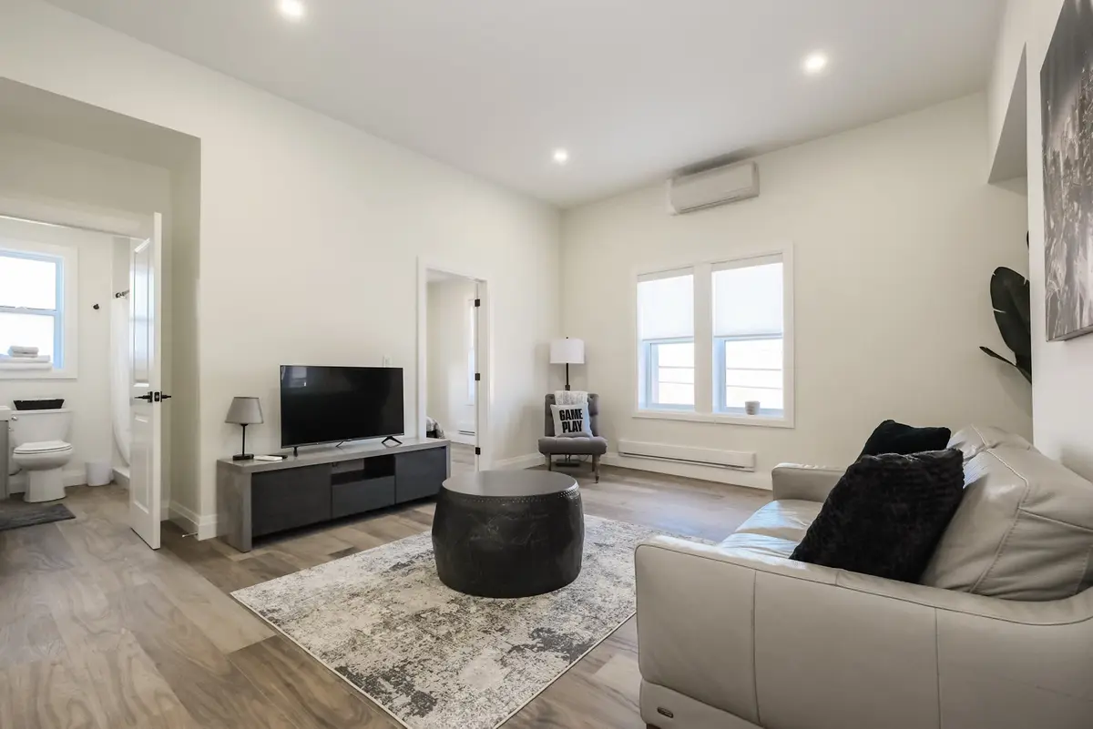 Furnished living room at Gateway Suites